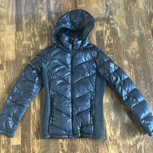 Women’s Michael Kors packable down fill jacket.